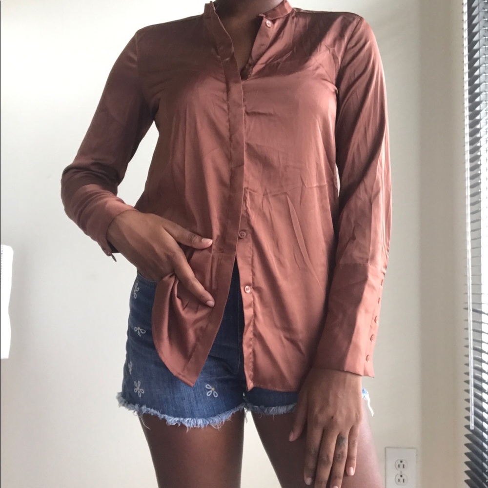 Copper button down shirt.